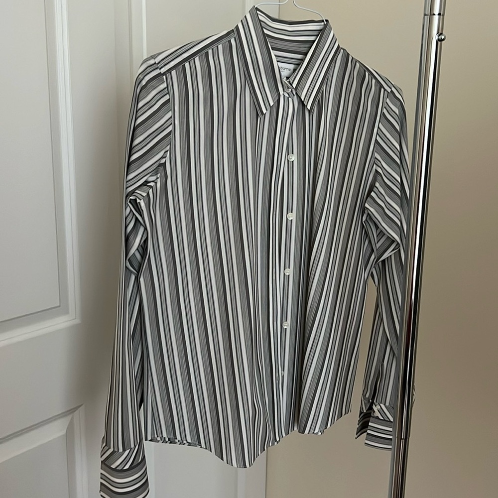 Grey and white long sleeve button down shirt.